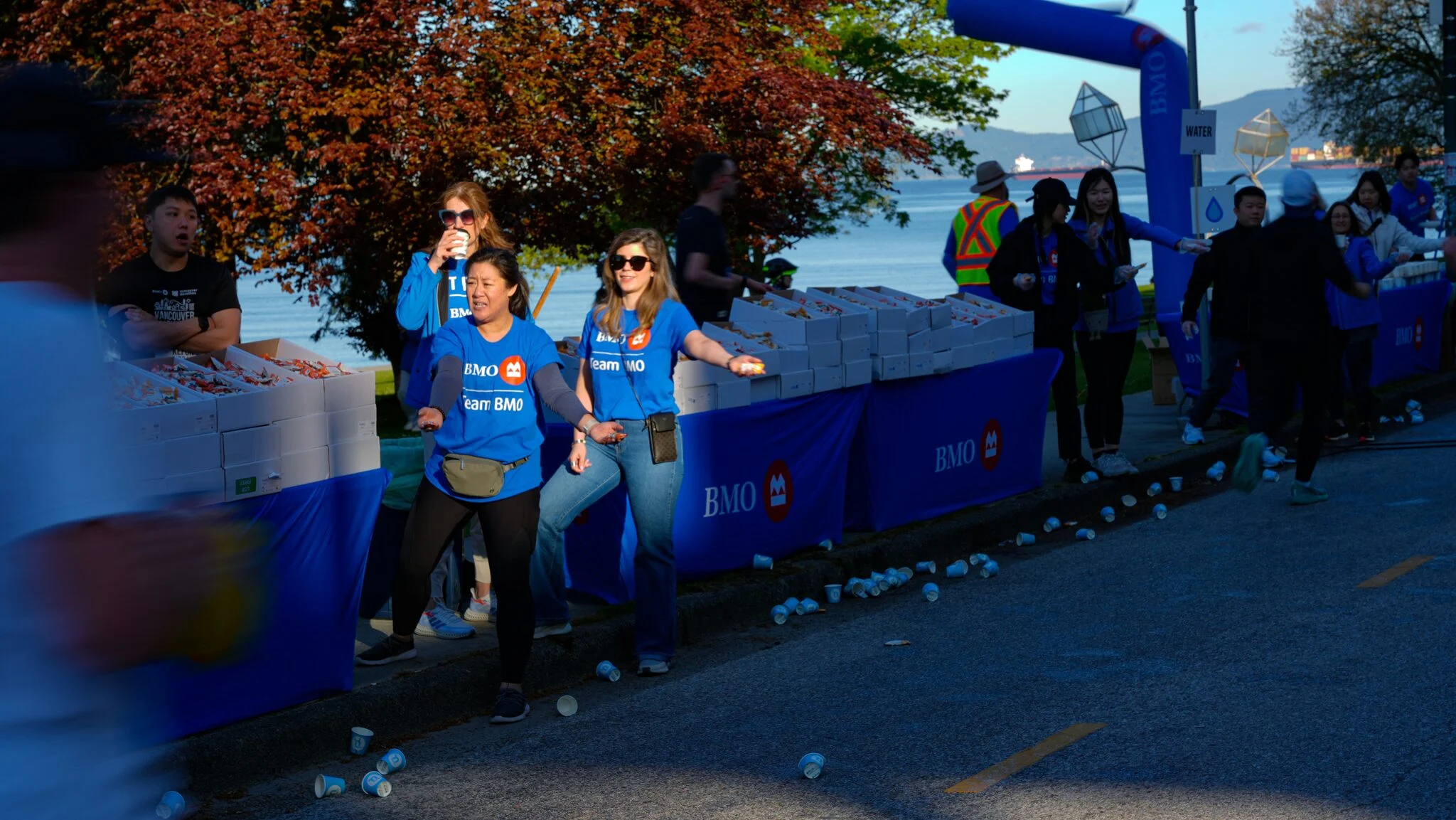 Volunteers in blue shirts at a community event