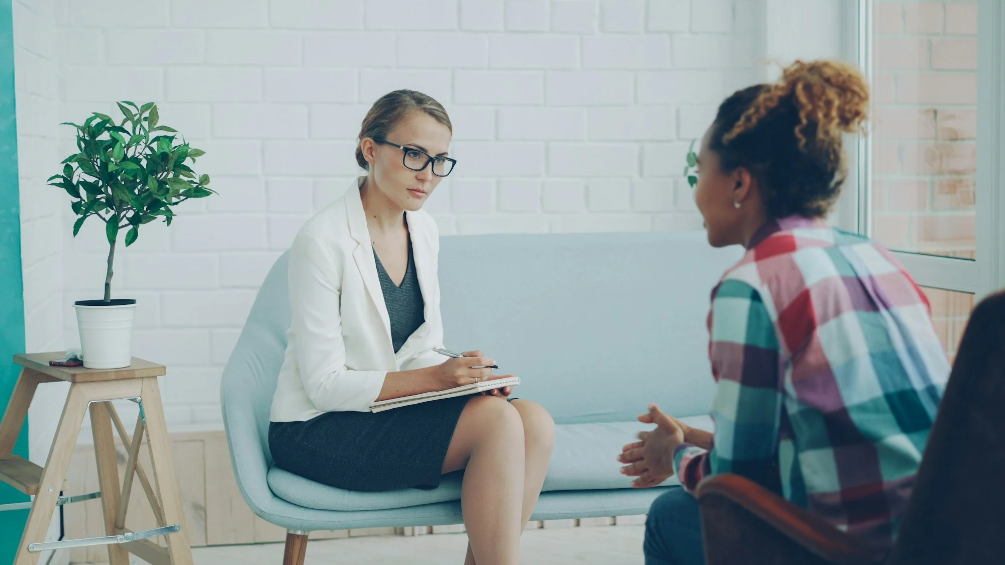 Psychologist in a counselling session with a client, psychologist insurance